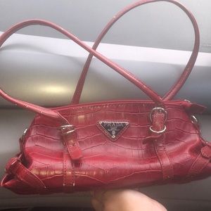 Red snakeskin Prada purse
